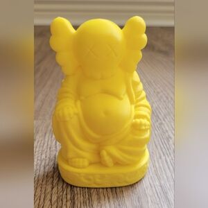 Buddha KAWS figurine